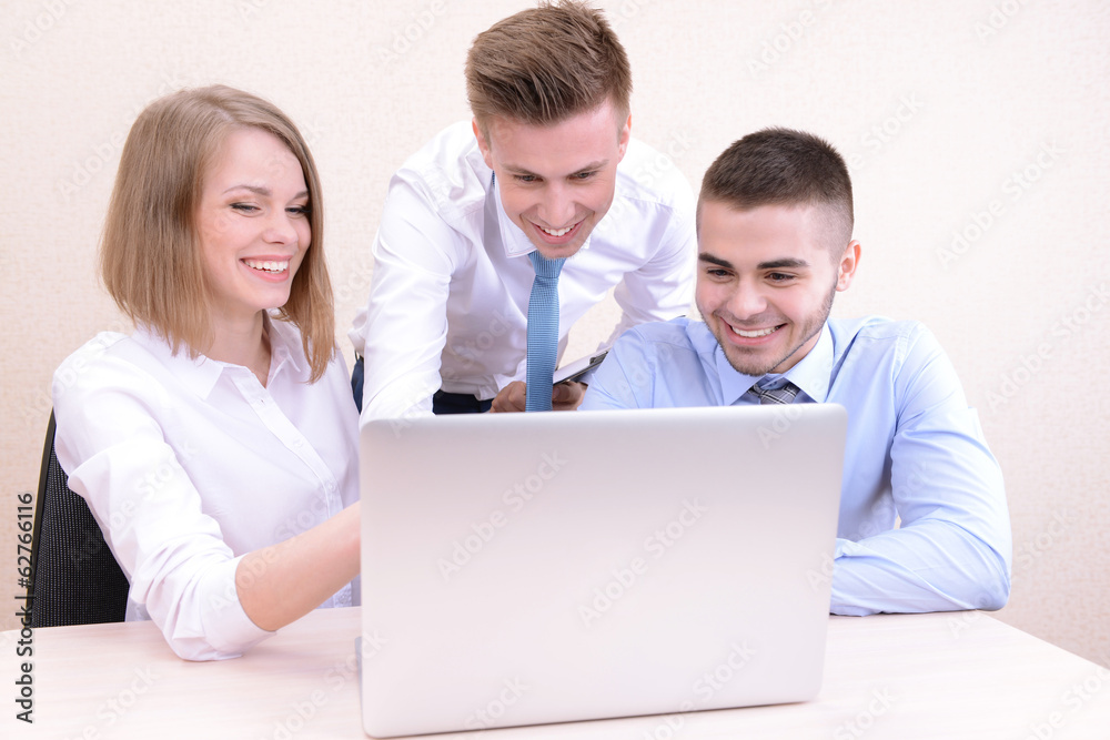 Successful young businesspeople working at office Successful young businesspeople working at office