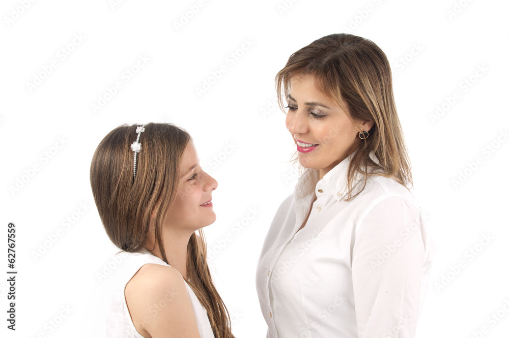 Mother embrace daughter shot against a white background.. Mother embrace daughter shot against a white background..