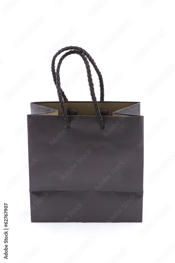 isolated of the black paper bag for shopping on a white backgrou isolated of the black paper bag for shopping on a white backgrou