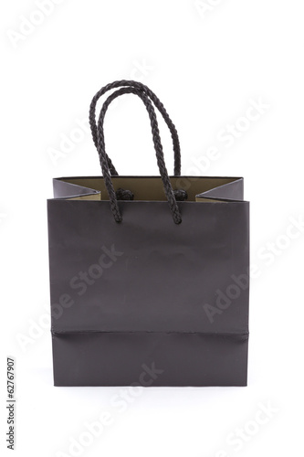 isolated of the black paper bag for shopping on a white backgrou