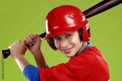 Photography portrait of a beautiful teen baseball player in red and white un