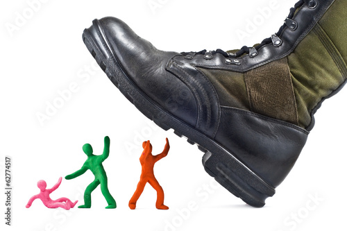 Fotografija Army boots crushes plasticine people