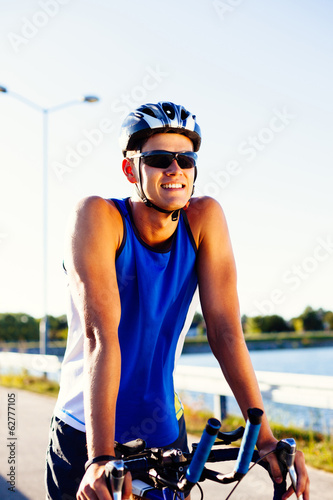 Triathlete with his bicycle