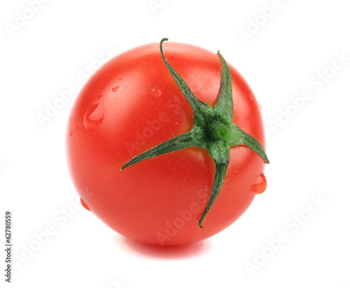 Fresh tomato with water drops.