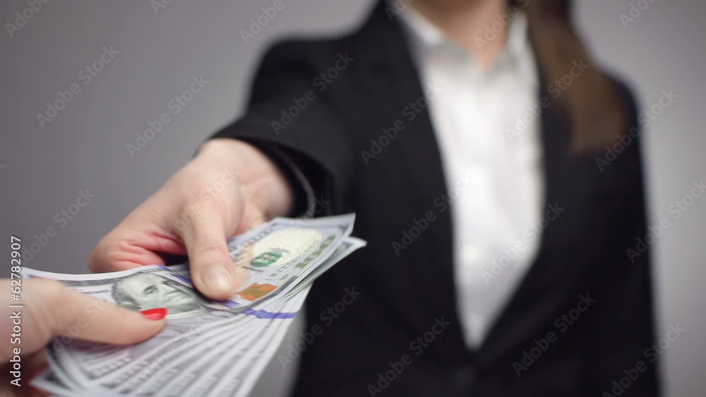 businesswoman giving money away
