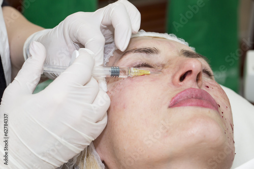 Cosmetic treatment with botox injection in a clinic