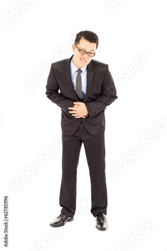 Businessman holding his stomach in pain