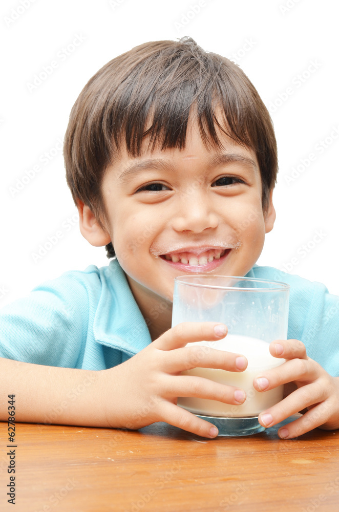 Little boy drinking milk with smiling Little boy drinking milk with smiling