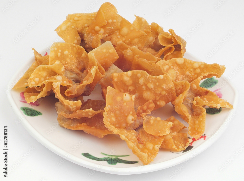 Fried wantons on the background Fried wantons on the background