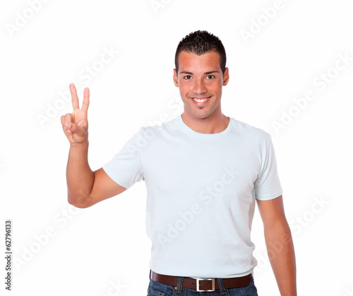 Handsome young guy with victory sign