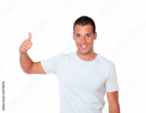 Charismatic hispanic man with positive sign