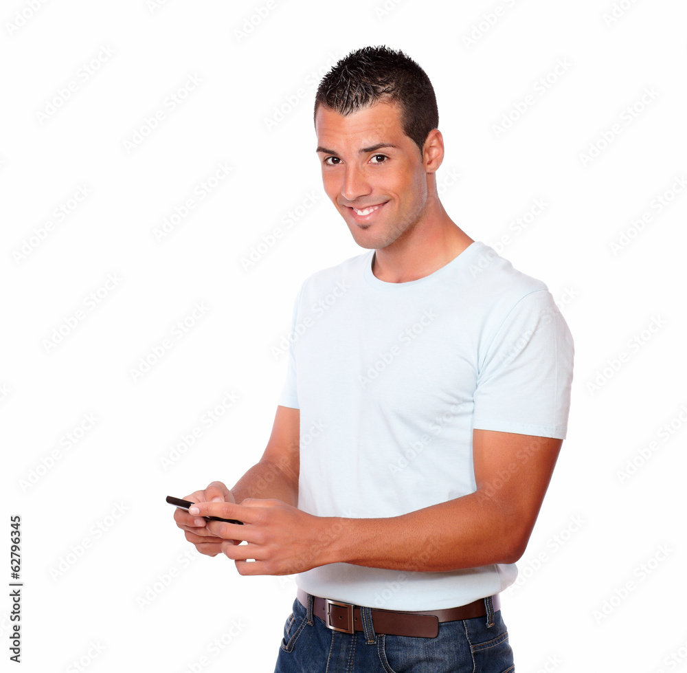 Fashionable man sending a message by mobile Fashionable man sending a message by mobile