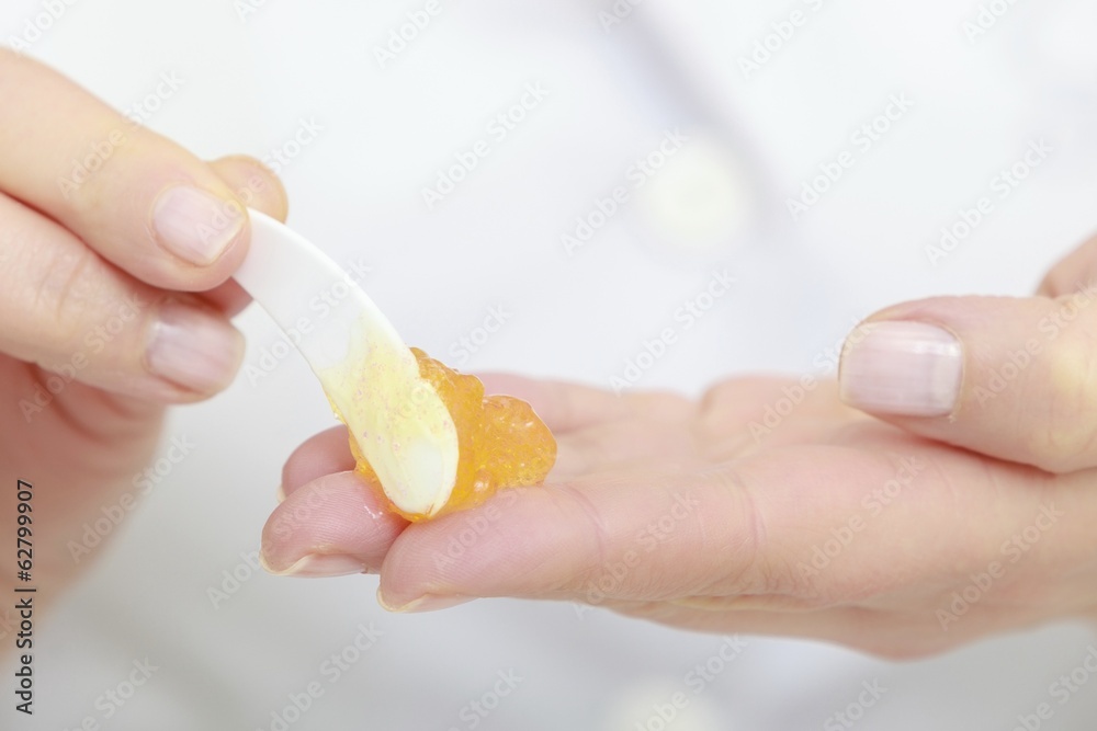 Beautician hands with moisturizing cream. Skincare. Beautician hands with moisturizing cream. Skincare.