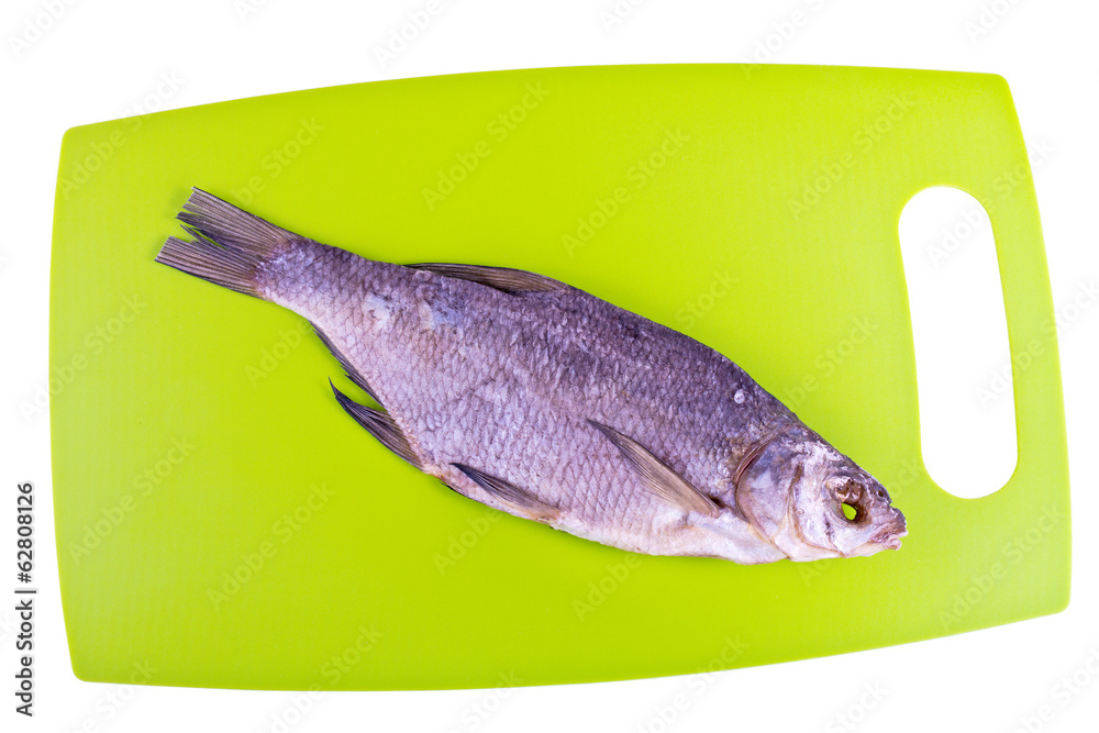 Fototapeta premium Cutting board in the kitchen and the dried bream