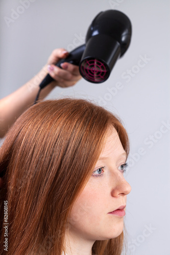 Hair styling in beauty salon