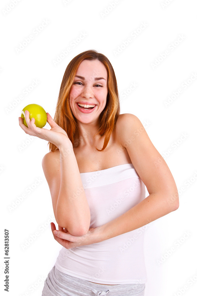 Attractive young woman with apple laughing Attractive young woman with apple laughing