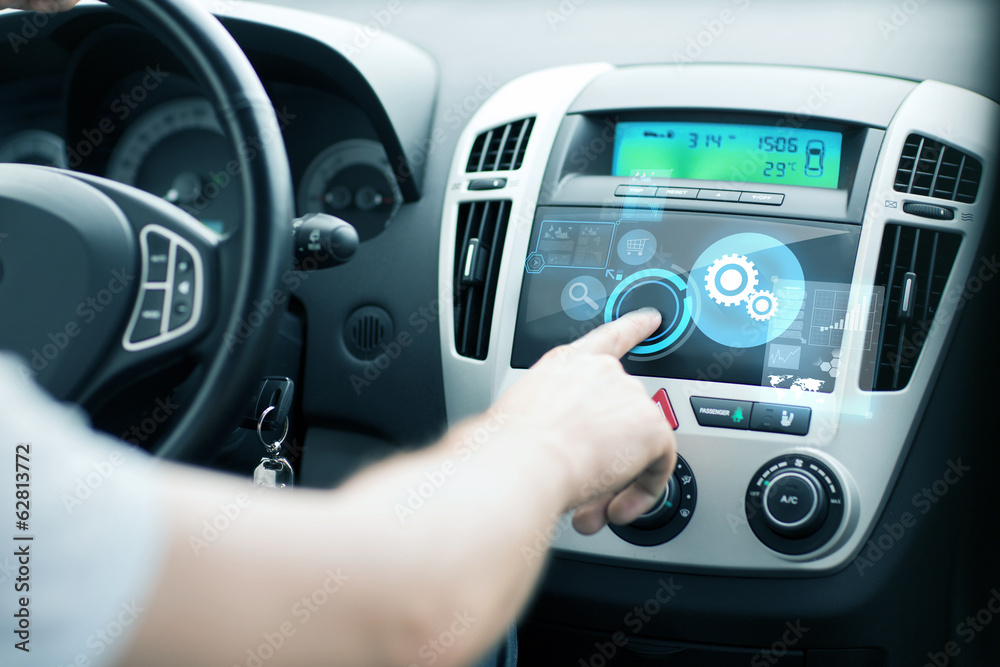 man using car control panel man using car control panel