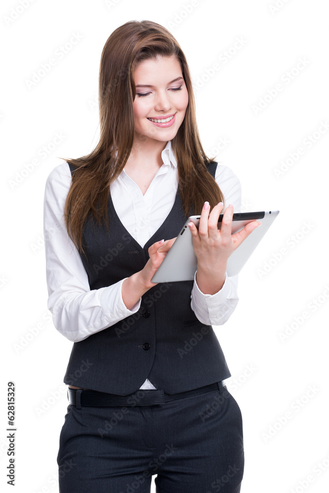 Beautiful young business woman using tablet. Beautiful young business woman using tablet.