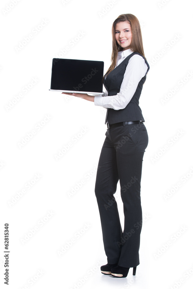 Successful young business woman holding laptop. Successful young business woman holding laptop.