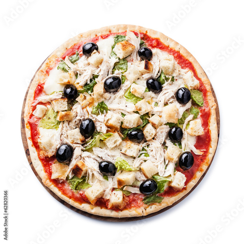 Italian pizza Caesar with with chicken, croutons and greens on w