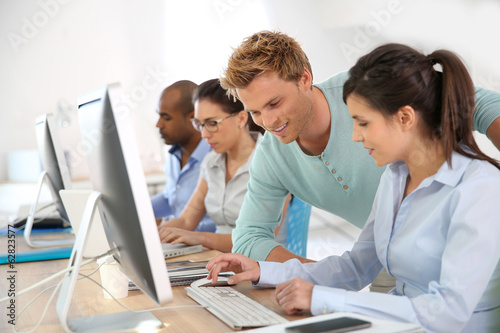 Group of young adults in business training