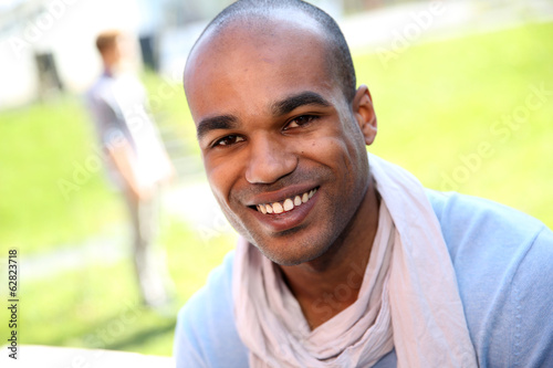 Portrait of smiling student at college campus