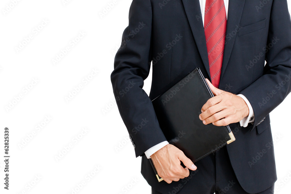 Portrait of a businessman holding a folder Portrait of a businessman holding a folder