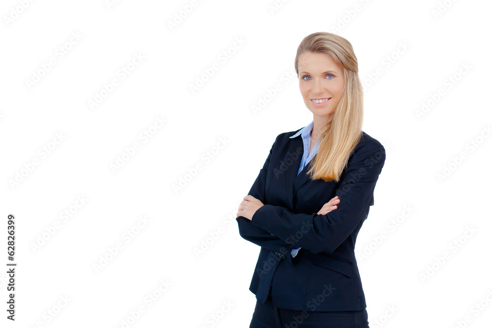 Blond businesswoman standing with crossed arms Blond businesswoman standing with crossed arms