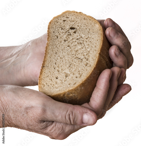 old hand with bread