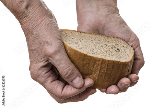 old hand with bread
