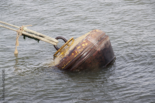An anchor buoy in the port photo