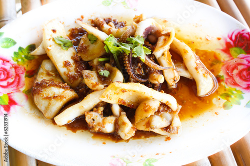 Fried squid with garlic and pepper.