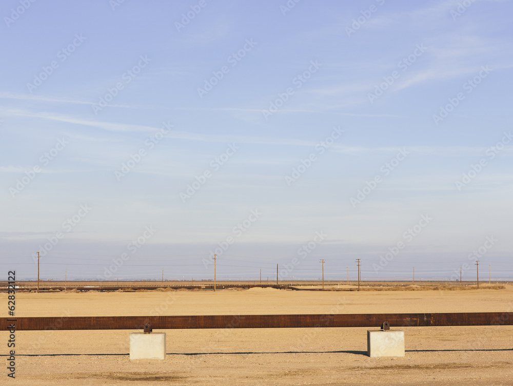 Elevated oil pipeline in the Midway-Sunset oil fields, the largest shale oil field in California. Elevated oil pipeline in the Midway-Sunset oil fields, the largest shale oil field in California.