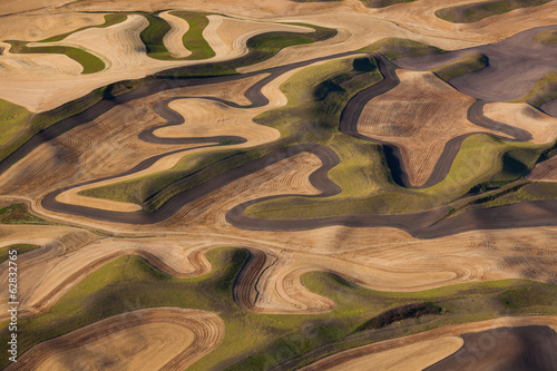 Farmland landscape, with ploughed fields and furrows in Palouse, Washington, USA. An aerial view with natural patterns. 
