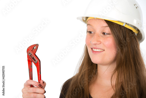 smiling young woman with pipe tongs photo