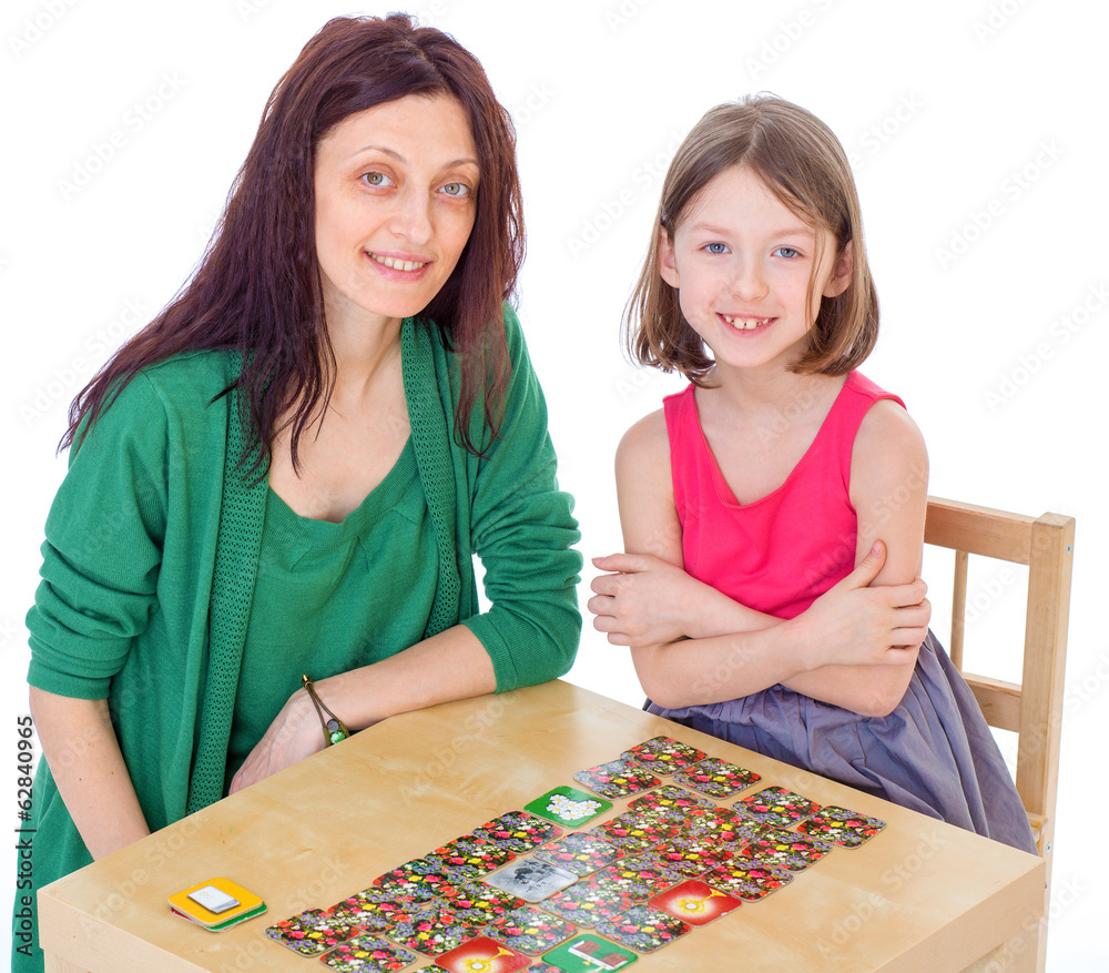 Fototapeta premium Mom and daughter at the table.
