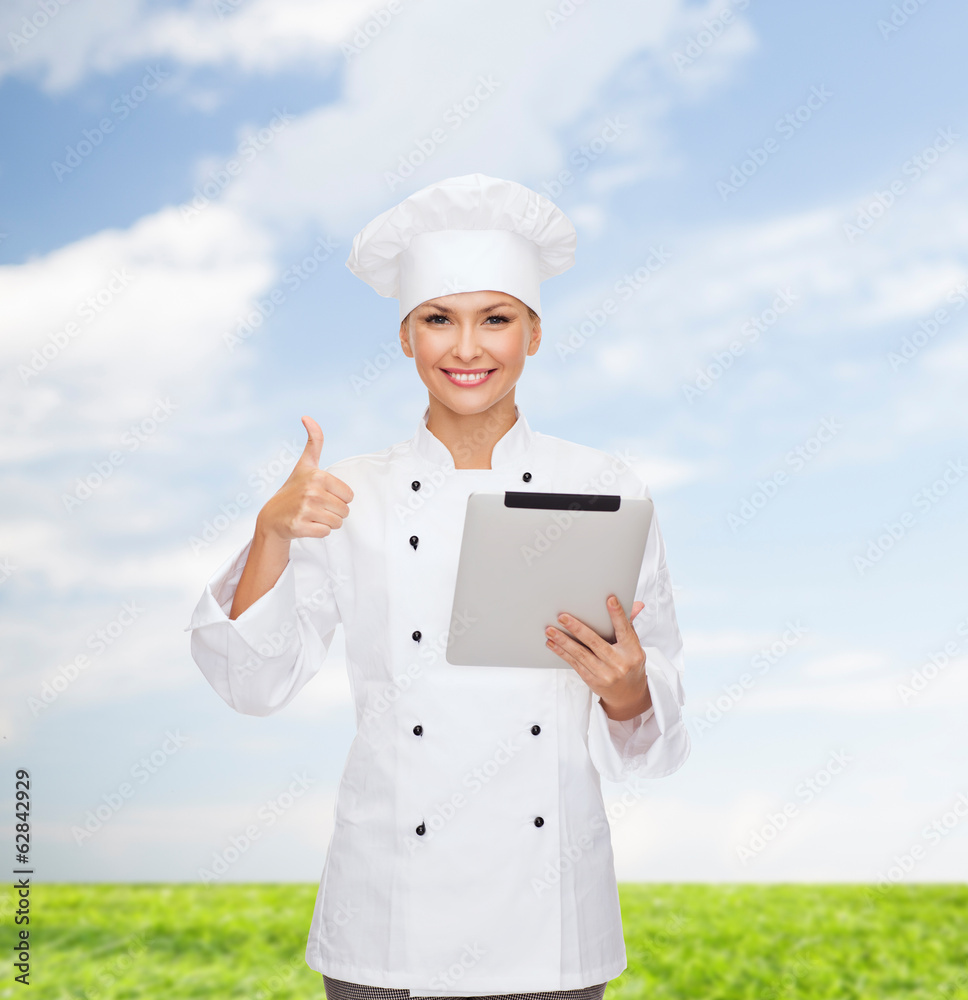smiling female chef with tablet pc computer smiling female chef with tablet pc computer