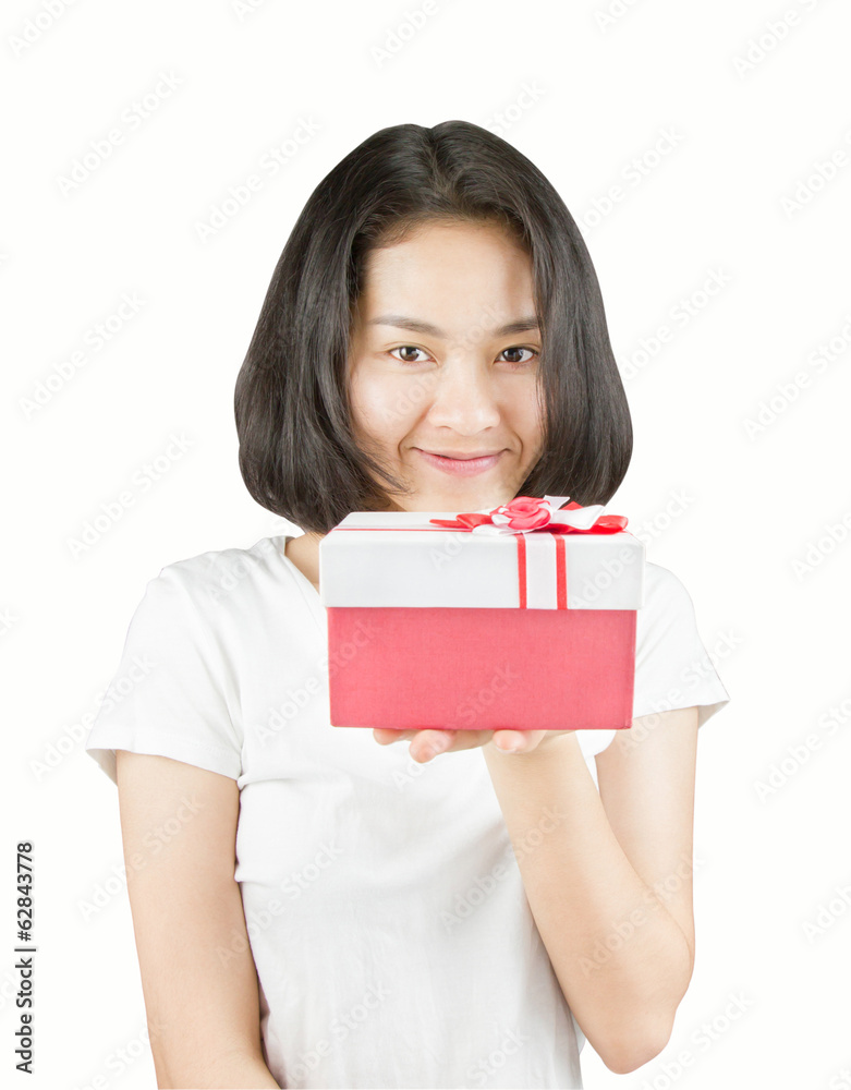 Young Asian women with no makeup holding gift box with smiley fa Young Asian women with no makeup holding gift box with smiley fa