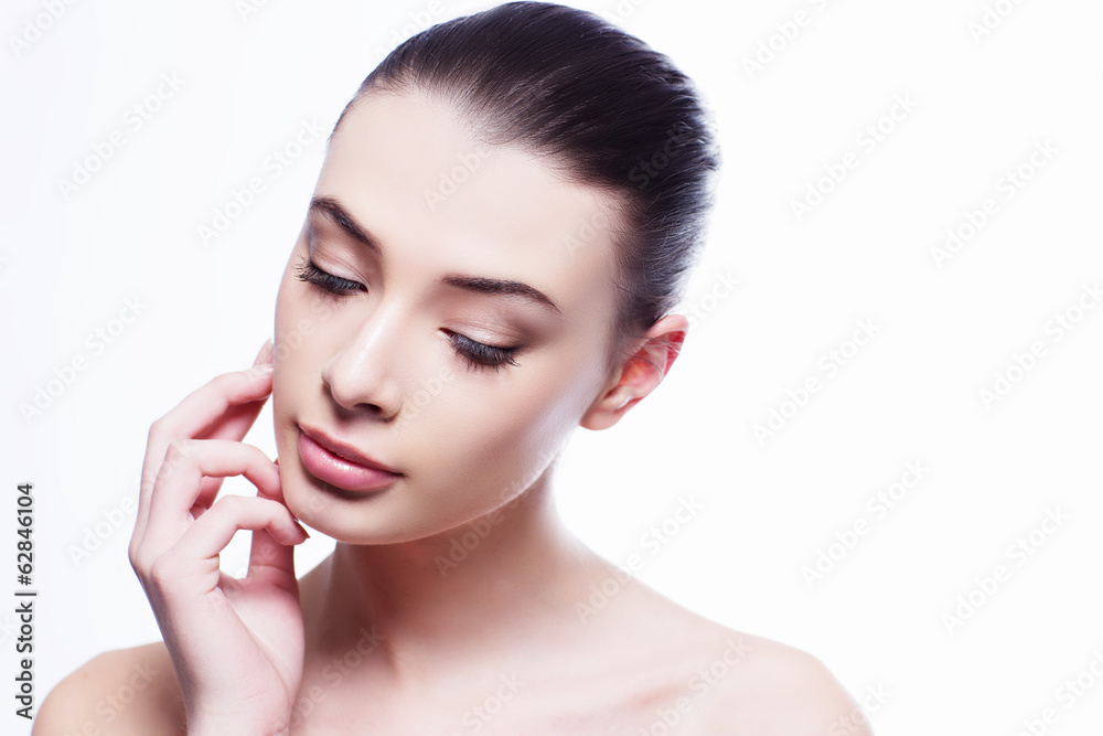 Beauty Portrait. Beautiful Spa Woman Touching her Face Beauty Portrait. Beautiful Spa Woman Touching her Face