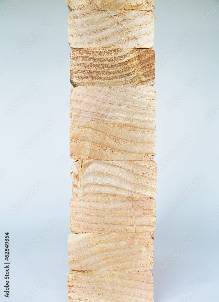 Stack of sawn prepared timber, spruce wood planks or studs, for use