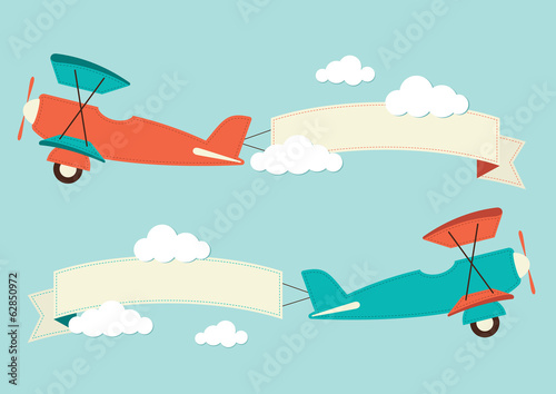 Biplanes and banners in the clouds