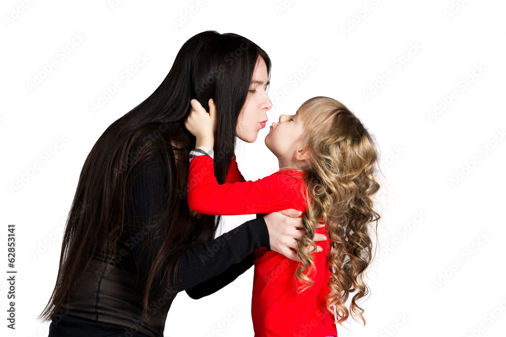mother and daughter kissing mother and daughter kissing