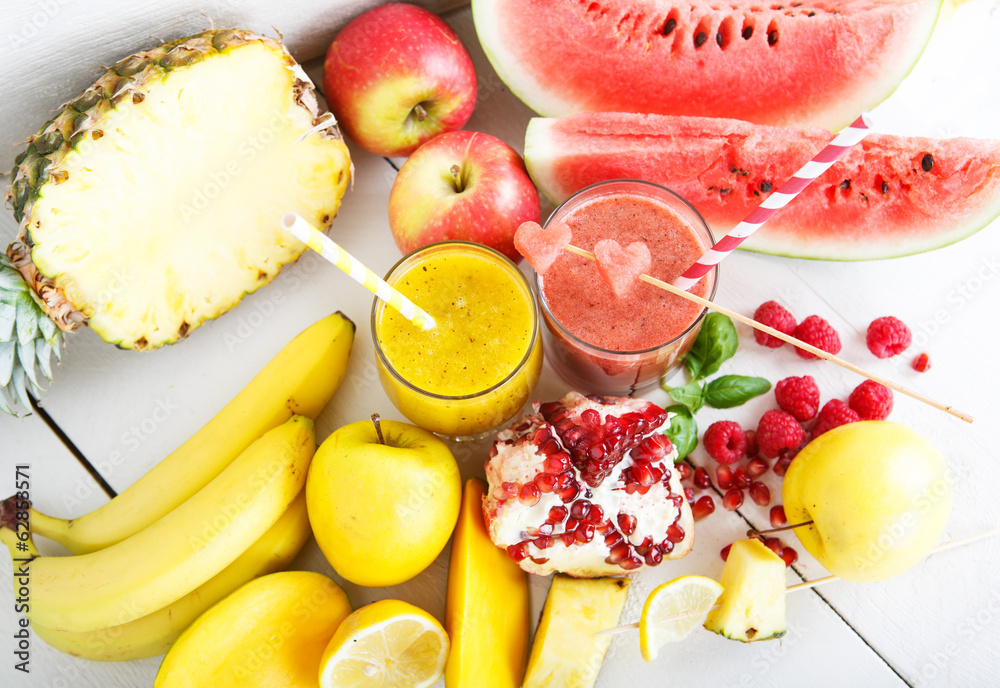 Fresh organic red and yellow smoothie with apple, watermelon, po Fresh organic red and yellow smoothie with apple, watermelon, po