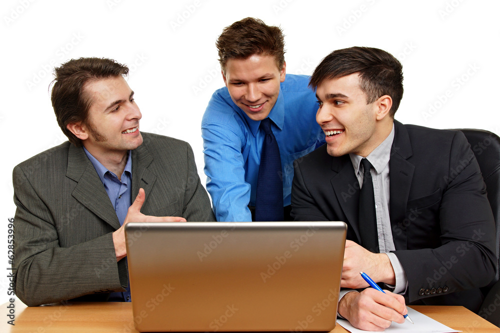 Smiling young business people discussing about ideas Smiling young business people discussing about ideas