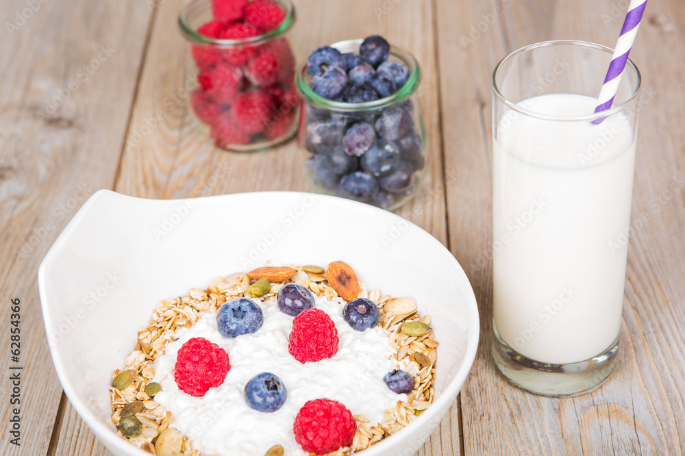 Fresh yoghurt with home made cereals and muesli, fresh raspberry Fresh yoghurt with home made cereals and muesli, fresh raspberry