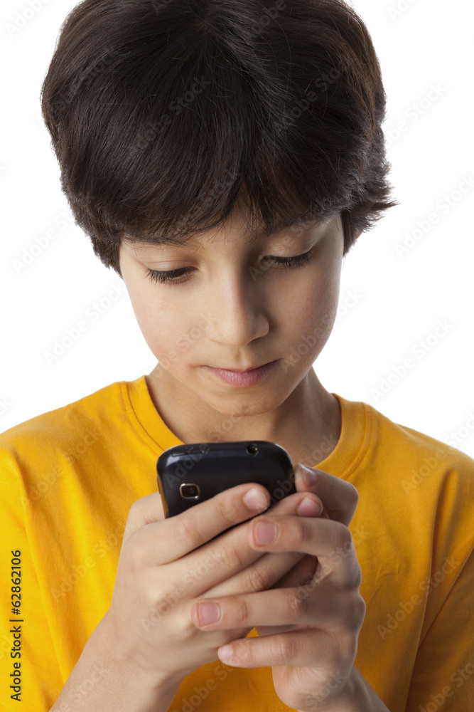 Eight year old boy reading text message Eight year old boy reading text message