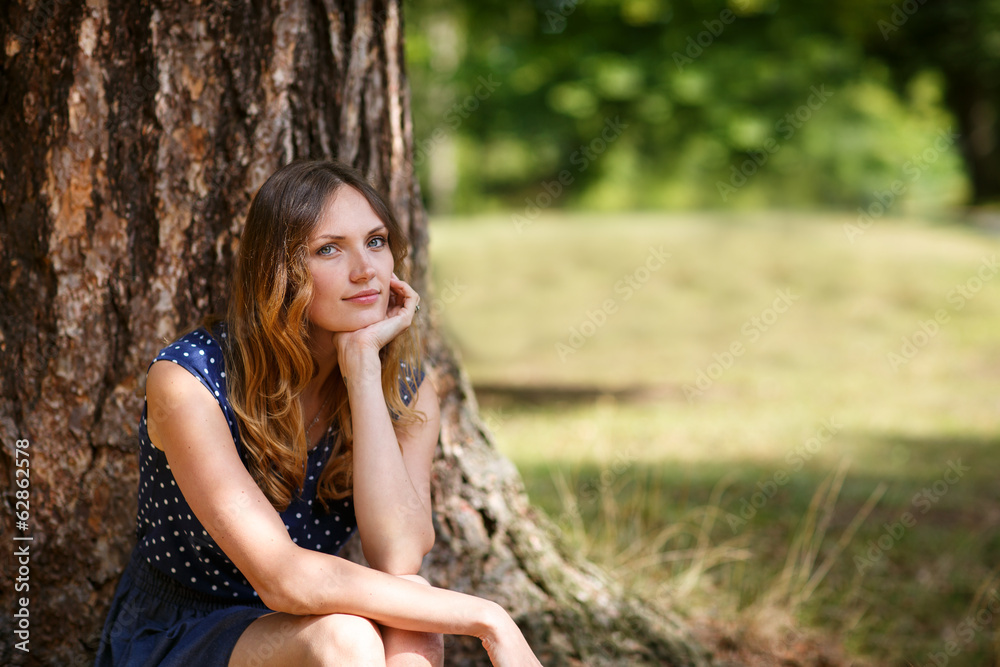 Portrait of young beautiful woman in summer forest Portrait of young beautiful woman in summer forest