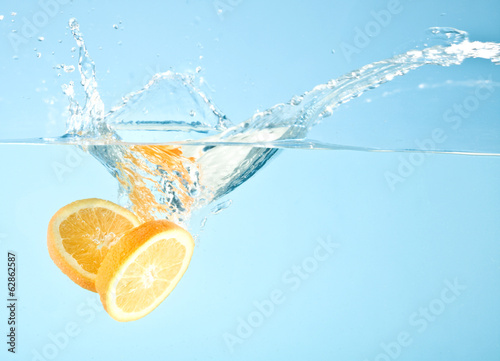 fruits splashed into water