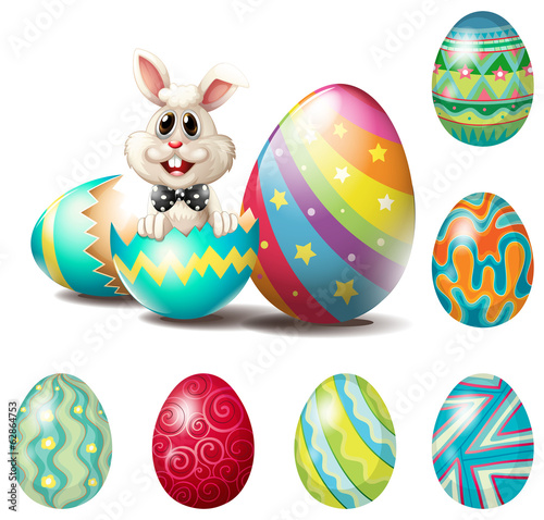 A happy bunny with colorful eggs