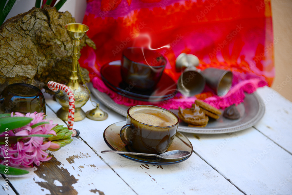 Coffee time in Eastern ethnic style and fucshia Coffee time in Eastern ethnic style and fucshia